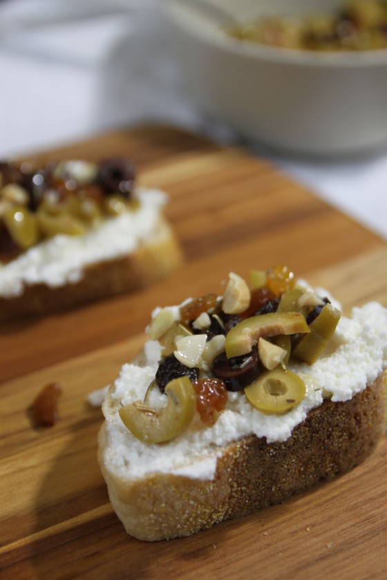 honeyed almond, raisin, olive and ricotta crostini