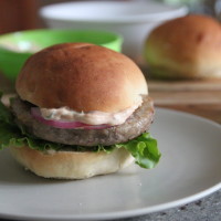 turkey burgers with spicy herb mayo and pickled onions